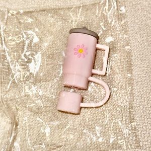 Stanley cup silicone straw topper in pink .